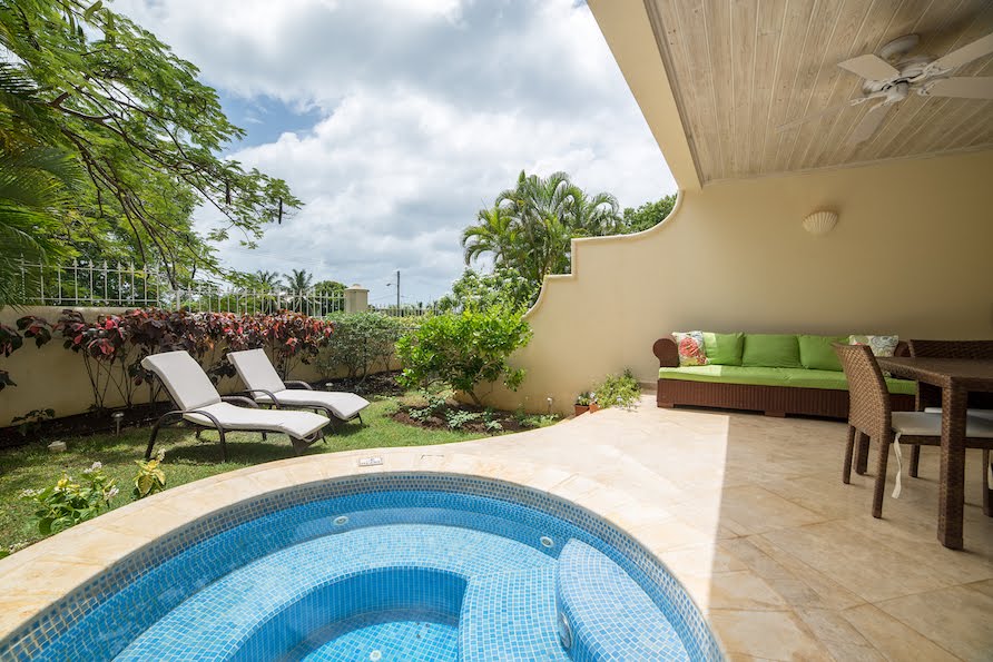 Patio with ceramic tile finish and wooden ceilings